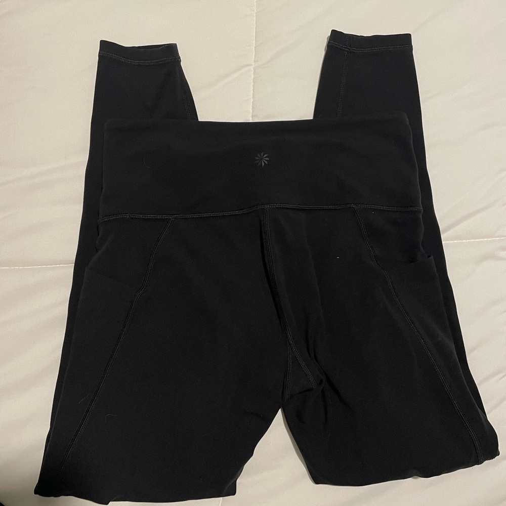 Athleta Stash Pocket Salutation Tight